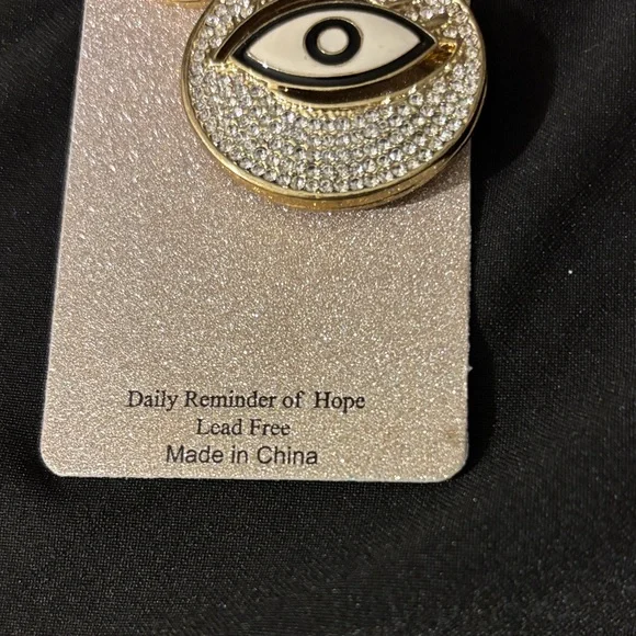 Natasha Couture Gold and Black Eye Keychain - Picture 4 of 4